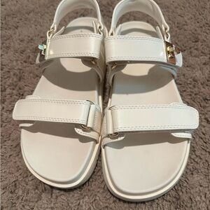 White Sandals with Gold Accents